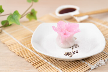 Chinese pink color flower dumpling or dim sum