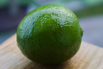 Lemon on a wooden cutting board