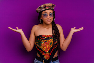 Young african american woman isolated on yellow background Young african american woman isolated on...