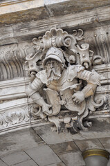 Fototapeta na wymiar Decorative gatekeeper sculpture on archway of Dresden's royal palace.