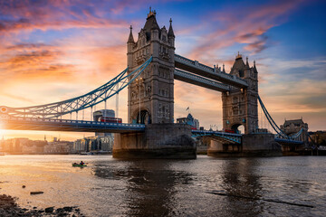 Fototapeta na wymiar Low angle view of the landmark Tower Bridge in London, United Kingdom, during a colorful sunset