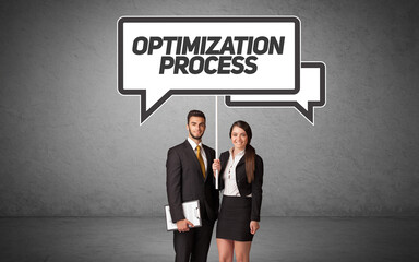 business person in casual holding road sign