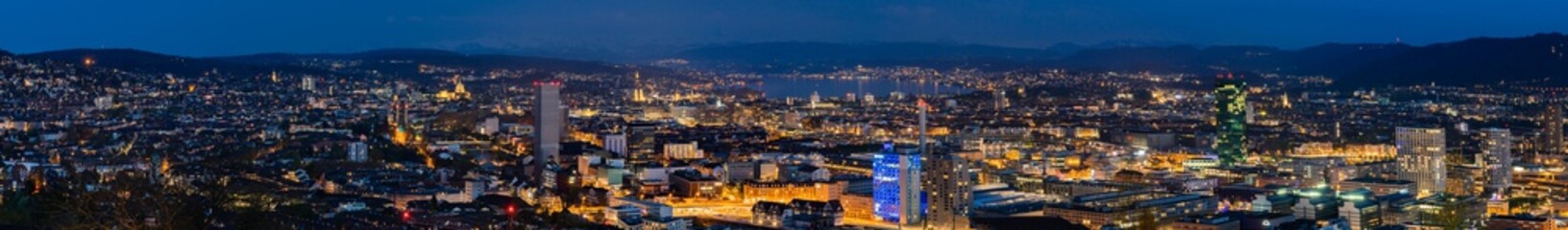 Great blue hour cityscape panorama of Z&uuml;rich, the largest city in Switzerland. It is located in north-central Switzerland at the northwestern tip of Lake Z&uuml;rich.