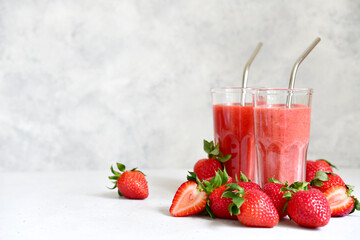 Fresh strawberry banana smoothie in a tall glasses.