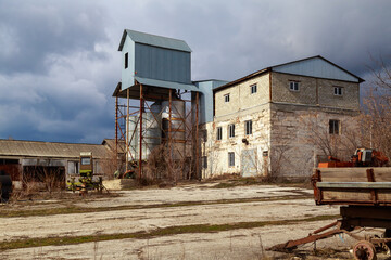 Devastation and decline in the agro-industrial sector. Cemetery of old rusty agricultural...