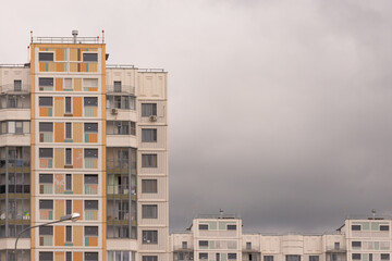 Roofs of multi-storey buildings. Panel construction and a gloomy sky.