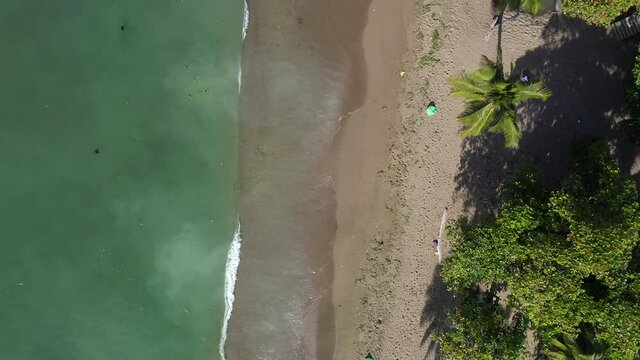 Flying over Montesinos Beach, Dominican Republic. Aerial top-down pov