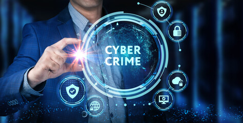 Fototapeta premium Cyber security data protection business technology privacy concept. Young businessman select the icon Cyber crime on the virtual display.