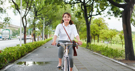 Asian woman commute by bicycle