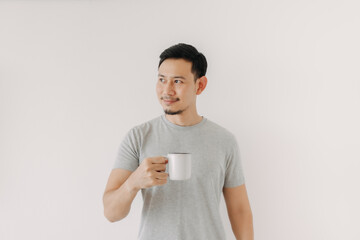 Happy Asian man hold a cup of coffee isolated on white background.