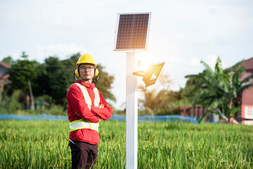 Agronomists use a tablet computer to collect data with a tool, the solar cell system in the Smart...