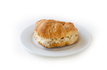 Freshly baked croissants with chicken, isolated on white background.
