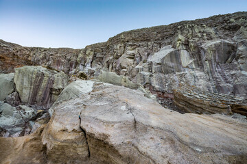 Rock wall and sulphur mining in Ijen crater in the morning in Kawah Ijen volcano Landmark from East Java Indonesia