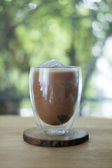 Iced mocha coffee served in the designed double-wall glass.