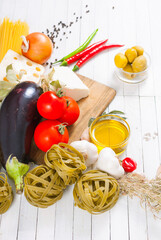 mediterranean food ingredients on white wood table