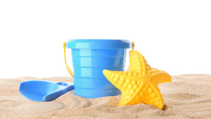 Fototapeta na wymiar Set of beach toys for children on sand against white background