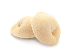 Uncooked dumplings on white background