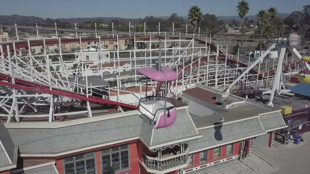 Santa Cruz Beach Cable Car Roller Coaster Amusement Park Aerial View Tracking Left