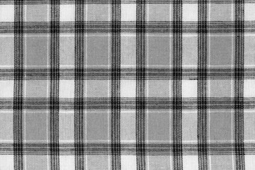 Black and white tartan texture background. shirt fabric with a checkered pattern. factory material