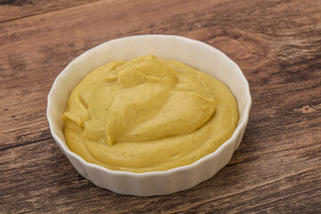 Dijon mustard sauce in the bowl