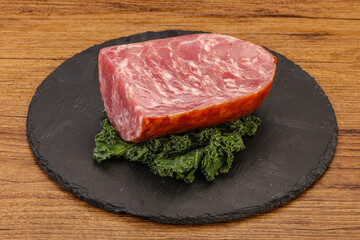 Beef ham piece over board