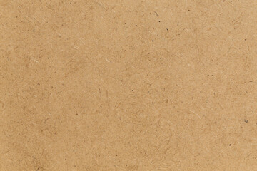 Pressed beige chipboard texture.