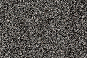 Crushed granite stones wall - close up