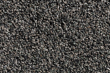 Crushed granite stones wall - close up