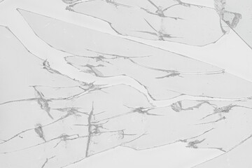 Broken pieces of glass on white background