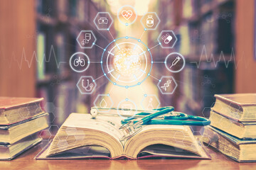 Medical school education with telemedicine and telehealth science study and lab research concept with global healthcare educational icons on old book and stethoscope in learning class room or library