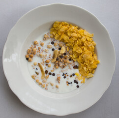 corn and oatmeal with dried fruit and milk
