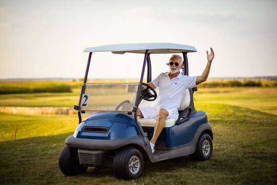 A Man Arrives At A Golf Course.