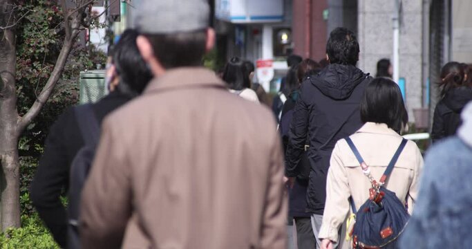 A high speed of walking office workers at urban city in Shinjuku