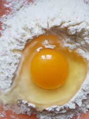 Still life with flour, egg on the kitchen table
