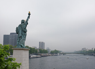  The swan island became a haven for a smaller Statue of Liberty. The copper lady, 11.5 meters high, peers at the distant shores of the American continent