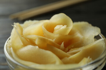 Glass bowl with pickled ginger, close up