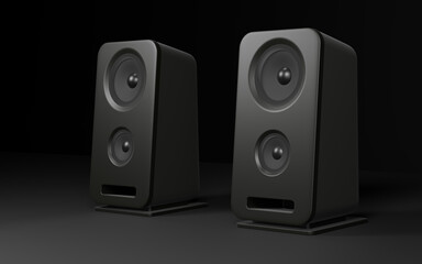 Fototapeta premium two computer speakers over black background