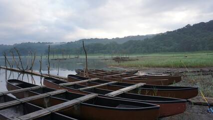 row of fishing boats and beautiful scenery