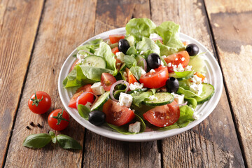 vegetable salad with tomato,  cucumber and feta cheese