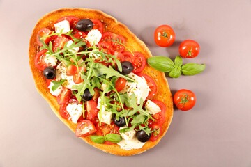 bruschetta with tomato, olive, mozzarella