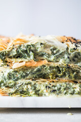 Homemade greek spanakopita pie with organic spinach