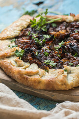 Homemade Savory Onion  Galette Pastry with Cheese and Herbs