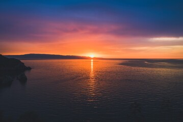Fototapeta premium Magical sunrise over the sea, tranquil scenery. 