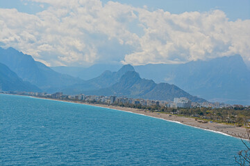 blue sky with clouds with mountains with sea 