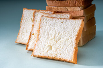 Toast bread slices stacked into towers