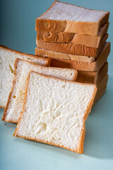 Toast bread slices stacked into towers