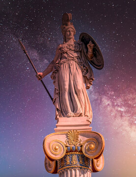 Athena the ancient Greek goddess of wisdom and knowledge under starry night sky, Athens Greece