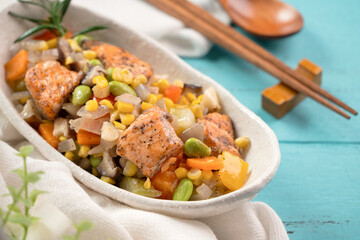 Fresh salmon cube with stir-fried mixed vegetables.