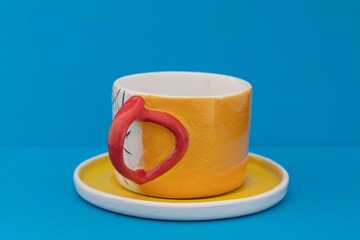 handmade ceramic mug with interesting design