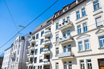 Fototapeta na wymiar Row of houses with renovated old buildings in Neuhausen, Munich, beautiful old buildings, Art Nouveau